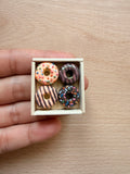 Donut box fridge magnet